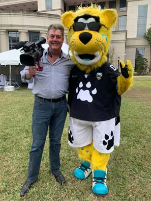 Dec 2019 James Jenkns with Jaguars mascot at the Freed to Run finish line