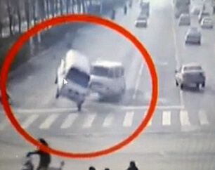 bizzare car accident image from traffic video cam