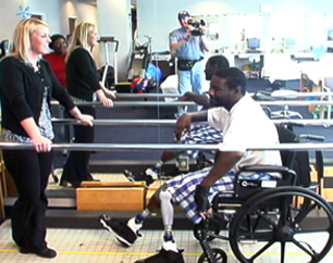 therapy in wheelchair filmed for a Day in the Life legal video in a personal injury case